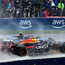 MONTREAL, QUEBEC - JUNE 09: Sergio Perez of Mexico driving the (11) Oracle Red Bull Racing RB20 battles for position with Esteban Ocon of France driving the (31) Alpine F1 A524 Renault on track during the F1 Grand Prix of Canada at Circuit Gilles Villeneuve on June 09, 2024 in Montreal, Quebec. (Photo by Mark Thompson/Getty Images)