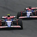 SHANGHAI, CHINA - APRIL 21: Yuki Tsunoda of Japan driving the (22) Visa Cash App RB VCARB 01 leads Daniel Ricciardo of Australia driving the (3) Visa Cash App RB VCARB 01 on track  during the F1 Grand Prix of China at Shanghai International Circuit on April 21, 2024 in Shanghai, China. (Photo by Clive Mason - Formula 1/Formula 1 via Getty Images)