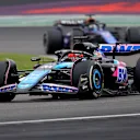 SHANGHAI, CHINA - APRIL 21: Esteban Ocon of France driving the (31) Alpine F1 A524 Renault leads Alexander Albon of Thailand driving the (23) Williams FW46 Mercedes on track during the F1 Grand Prix of China at Shanghai International Circuit on April 21, 2024 in Shanghai, China. (Photo by Lintao Zhang/Getty Images )