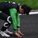SHANGHAI, CHINA - APRIL 21: 13th placed Zhou Guanyu of China and Stake F1 Team Kick Sauber reacts in parc ferme during the F1 Grand Prix of China at Shanghai International Circuit on April 21, 2024 in Shanghai, China. (Photo by Lars Baron/Getty Images)
