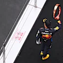 SHANGHAI, CHINA - APRIL 21: Third placed Sergio Perez of Mexico and Oracle Red Bull Racing celebrates on the podium during the F1 Grand Prix of China at Shanghai International Circuit on April 21, 2024 in Shanghai, China. (Photo by Clive Mason - Formula 1/Formula 1 via Getty Images)