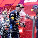 SHANGHAI, CHINA - APRIL 21: Race winner Max Verstappen of the Netherlands and Oracle Red Bull Racing, Third placed Sergio Perez of Mexico and Oracle Red Bull Racing and Oracle Red Bull Racing Head of Car Engineering Paul Monaghan celebrate on the podium during the F1 Grand Prix of China at Shanghai International Circuit on April 21, 2024 in Shanghai, China. (Photo by Lintao Zhang/Getty Images )