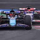 SHANGHAI, CHINA - APRIL 21: Esteban Ocon of France driving the (31) Alpine F1 A524 Renault leads Daniel Ricciardo of Australia driving the (3) Visa Cash App RB VCARB 01 on track during the F1 Grand Prix of China at Shanghai International Circuit on April 21, 2024 in Shanghai, China. (Photo by Lars Baron/Getty Images)