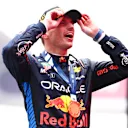 SHANGHAI, CHINA - APRIL 21: Race winner Max Verstappen of the Netherlands and Oracle Red Bull Racing celebrates on the podium after the F1 Grand Prix of China at Shanghai International Circuit on April 21, 2024 in Shanghai, China. (Photo by Bryn Lennon - Formula 1/Formula 1 via Getty Images)