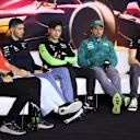 SHANGHAI, CHINA - APRIL 18: Lando Norris of Great Britain and McLaren, Charles Leclerc of Monaco and Ferrari, Esteban Ocon of France and Alpine F1, Zhou Guanyu of China and Stake F1 Team Kick Sauber, Fernando Alonso of Spain and Aston Martin F1 Team and Nico Hulkenberg of Germany and Haas F1 attend the Drivers Press Conference during previews ahead of the F1 Grand Prix of China at Shanghai International Circuit on April 18, 2024 in Shanghai, China. (Photo by Lintao Zhang/Getty Images )
