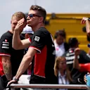 IMOLA, ITALY - MAY 19: Nico Hulkenberg of Germany and Haas F1 blows kisses to the crowd on the drivers parade prior to the F1 Grand Prix of Emilia-Romagna at Autodromo Enzo e Dino Ferrari Circuit on May 19, 2024 in Imola, Italy. (Photo by Peter Fox - Formula 1/Formula 1 via Getty Images)