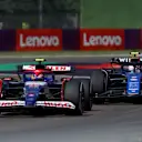 IMOLA, ITALY - MAY 19: Yuki Tsunoda of Japan driving the (22) Visa Cash App RB VCARB 01 leads Logan Sargeant of United States driving the (2) Williams FW46 Mercedes during the F1 Grand Prix of Emilia-Romagna at Autodromo Enzo e Dino Ferrari Circuit on May 19, 2024 in Imola, Italy. (Photo by Joe Portlock - Formula 1/Formula 1 via Getty Images)