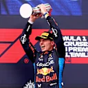 IMOLA, ITALY - MAY 19: Race winner Max Verstappen of the Netherlands and Oracle Red Bull Racing celebrates on the podium during the F1 Grand Prix of Emilia-Romagna at Autodromo Enzo e Dino Ferrari Circuit on May 19, 2024 in Imola, Italy. (Photo by Clive Rose/Getty Images)