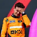IMOLA, ITALY - MAY 19: Second placed Lando Norris of Great Britain and McLaren celebrates on the podium during the F1 Grand Prix of Emilia-Romagna at Autodromo Enzo e Dino Ferrari Circuit on May 19, 2024 in Imola, Italy. (Photo by Clive Rose/Getty Images)