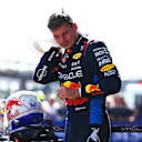 IMOLA, ITALY - MAY 18: Pole position qualifier Max Verstappen of the Netherlands and Oracle Red Bull Racing wipes his head with a towel in parc ferme during qualifying ahead of the F1 Grand Prix of Emilia-Romagna at Autodromo Enzo e Dino Ferrari Circuit on May 18, 2024 in Imola, Italy. (Photo by Mark Thompson/Getty Images)