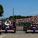 IMOLA, ITALY - MAY 18: 7th placed qualifier Yuki Tsunoda of Japan and Visa Cash App RB and 9th placed qualifier Daniel Ricciardo of Australia and Visa Cash App RB stop in parc ferme during qualifying ahead of the F1 Grand Prix of Emilia-Romagna at Autodromo Enzo e Dino Ferrari Circuit on May 18, 2024 in Imola, Italy. (Photo by Mark Thompson/Getty Images)