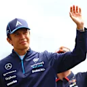 BUDAPEST, HUNGARY - JULY 21: Alexander Albon of Thailand and Williams waves to the crowd on the drivers parade prior to the F1 Grand Prix of Hungary at Hungaroring on July 21, 2024 in Budapest, Hungary. (Photo by Bryn Lennon - Formula 1/Formula 1 via Getty Images)