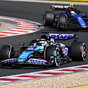 BUDAPEST, HUNGARY - JULY 21: Esteban Ocon of France driving the (31) Alpine F1 A524 Renault leads Logan Sargeant of United States driving the (2) Williams FW46 Mercedes on track  during the F1 Grand Prix of Hungary at Hungaroring on July 21, 2024 in Budapest, Hungary. (Photo by James Sutton - Formula 1/Formula 1 via Getty Images)
