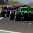 BUDAPEST, HUNGARY - JULY 21: Logan Sargeant of United States driving the (2) Williams FW46 Mercedes leads Zhou Guanyu of China driving the (24) Kick Sauber C44 Ferrari during the F1 Grand Prix of Hungary at Hungaroring on July 21, 2024 in Budapest, Hungary. (Photo by Bryn Lennon - Formula 1/Formula 1 via Getty Images)