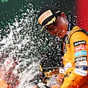 BUDAPEST, HUNGARY - JULY 21: Race winner Oscar Piastri of Australia and McLaren celebrates his maiden race win on the podium during the F1 Grand Prix of Hungary at Hungaroring on July 21, 2024 in Budapest, Hungary. (Photo by Dean Mouhtaropoulos/Getty Images)