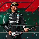 BUDAPEST, HUNGARY - JULY 21: Third placed Lewis Hamilton of Great Britain and Mercedes celebrates on the podium during the F1 Grand Prix of Hungary at Hungaroring on July 21, 2024 in Budapest, Hungary. (Photo by Joe Portlock - Formula 1/Formula 1 via Getty Images)
