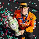 BUDAPEST, HUNGARY - JULY 21: Oscar Piastri of McLaren and Australia with the winners trophy after finishing in first position during the F1 Grand Prix of Hungary at Hungaroring on July 21, 2024 in Budapest, Hungary. (Photo by Peter Fox - Formula 1/Formula 1 via Getty Images)