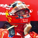 BUDAPEST, HUNGARY - JULY 19: Carlos Sainz of Spain and Ferrari prepares to drive itg during practice ahead of the F1 Grand Prix of Hungary at Hungaroring on July 19, 2024 in Budapest, Hungary. (Photo by Bryn Lennon - Formula 1/Formula 1 via Getty Images)