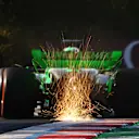 BUDAPEST, HUNGARY - JULY 19: Sparks fly behind Valtteri Bottas of Finland driving the (77) Kick Sauber C44 Ferrari during practice ahead of the F1 Grand Prix of Hungary at Hungaroring on July 19, 2024 in Budapest, Hungary. (Photo by Mark Thompson/Getty Images)