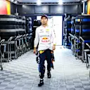 BUDAPEST, HUNGARY - JULY 20: Sergio Perez of Mexico and Oracle Red Bull Racing walks into the garage during qualifying ahead of the F1 Grand Prix of Hungary at Hungaroring on July 20, 2024 in Budapest, Hungary. (Photo by Mark Thompson/Getty Images)