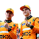 BUDAPEST, HUNGARY - JULY 20: Pole position qualifier Lando Norris of Great Britain and McLaren and Second placed qualifier Oscar Piastri of Australia and McLaren celebrates  in parc ferme during qualifying ahead of the F1 Grand Prix of Hungary at Hungaroring on July 20, 2024 in Budapest, Hungary. (Photo by Bryn Lennon - Formula 1/Formula 1 via Getty Images)