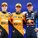 BUDAPEST, HUNGARY - JULY 20: Pole position qualifier Lando Norris of Great Britain and McLaren, Second placed qualifier Oscar Piastri of Australia and McLaren and Third placed qualifier Max Verstappen of the Netherlands and Oracle Red Bull Racing pose for a photo in parc ferme during qualifying ahead of the F1 Grand Prix of Hungary at Hungaroring on July 20, 2024 in Budapest, Hungary. (Photo by Bryn Lennon - Formula 1/Formula 1 via Getty Images)