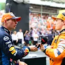 BUDAPEST, HUNGARY - JULY 20: Third placed qualifier Max Verstappen of the Netherlands and Oracle Red Bull Racing and Second placed qualifier Oscar Piastri of Australia and McLaren talk in parc ferme during qualifying ahead of the F1 Grand Prix of Hungary at Hungaroring on July 20, 2024 in Budapest, Hungary. (Photo by Bryn Lennon - Formula 1/Formula 1 via Getty Images)