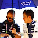MONZA, ITALY - SEPTEMBER 01: Franco Colapinto of Argentina and Williams talks to a Williams team member during the F1 Grand Prix of Italy at Autodromo Nazionale Monza on September 01, 2024 in Monza, Italy. (Photo by Clive Rose/Getty Images)