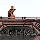 MONZA, ITALY - SEPTEMBER 01: Oscar Piastri of Australia and McLaren waves to fans as he walks to the podium during the F1 Grand Prix of Italy at Autodromo Nazionale Monza on September 01, 2024 in Monza, Italy. (Photo by James Sutton - Formula 1/Formula 1 via Getty Images)