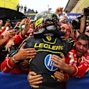 MONZA, ITALY - SEPTEMBER 01: Race winner Charles Leclerc of Monaco and Ferrari celebrates in parc ferme during the F1 Grand Prix of Italy at Autodromo Nazionale Monza on September 01, 2024 in Monza, Italy. (Photo by Bryn Lennon - Formula 1/Formula 1 via Getty Images)