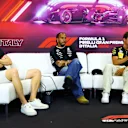 MONZA, ITALY - AUGUST 29: (L-R) Nico Hulkenberg of Germany and Haas F1, Lewis Hamilton of Great Britain and Mercedes and Charles Leclerc of Monaco and Ferrari attend the Drivers Press Conference during previews ahead of the F1 Grand Prix of Italy at Autodromo Nazionale Monza on August 29, 2024 in Monza, Italy. (Photo by Clive Rose/Getty Images)