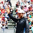 SUZUKA, JAPAN - APRIL 07: Pierre Gasly of France and Alpine F1 waves to the crowd on the drivers parade prior to the F1 Grand Prix of Japan at Suzuka International Racing Course on April 07, 2024 in Suzuka, Japan. (Photo by Bryn Lennon - Formula 1/Formula 1 via Getty Images)
