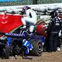 SUZUKA, JAPAN - APRIL 07: Alexander Albon of Thailand and Williams climbs out of his car after crashing during the F1 Grand Prix of Japan at Suzuka International Racing Course on April 07, 2024 in Suzuka, Japan. (Photo by Clive Rose - Formula 1/Formula 1 via Getty Images)