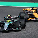 SUZUKA, JAPAN - APRIL 07: Lewis Hamilton of Great Britain driving the (44) Mercedes AMG Petronas F1 Team W15 leads Oscar Piastri of Australia driving the (81) McLaren MCL38 Mercedes during the F1 Grand Prix of Japan at Suzuka International Racing Course on April 07, 2024 in Suzuka, Japan. (Photo by Clive Rose - Formula 1/Formula 1 via Getty Images)