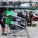 SUZUKA, JAPAN - APRIL 05: Alexander Albon of Thailand and Williams looks on in the Pitlane during practice ahead of the F1 Grand Prix of Japan at Suzuka International Racing Course on April 05, 2024 in Suzuka, Japan. (Photo by Bryn Lennon - Formula 1/Formula 1 via Getty Images)