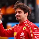 SUZUKA, JAPAN - APRIL 05: Charles Leclerc of Monaco and Ferrari waves from the pitlane during practice ahead of the F1 Grand Prix of Japan at Suzuka International Racing Course on April 05, 2024 in Suzuka, Japan. (Photo by Bryn Lennon - Formula 1/Formula 1 via Getty Images)