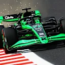 SUZUKA, JAPAN - APRIL 06: Sparks fly behind Valtteri Bottas of Finland driving the (77) Kick Sauber C44 Ferrari during final practice ahead of the F1 Grand Prix of Japan at Suzuka International Racing Course on April 06, 2024 in Suzuka, Japan. (Photo by Mark Thompson/Getty Images)
