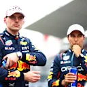 SUZUKA, JAPAN - APRIL 06: Pole position qualifier Max Verstappen of the Netherlands and Oracle Red Bull Racing and Second placed qualifier Sergio Perez of Mexico and Oracle Red Bull Racing look on in parc ferme during qualifying ahead of the F1 Grand Prix of Japan at Suzuka International Racing Course on April 06, 2024 in Suzuka, Japan. (Photo by Mark Thompson/Getty Images)