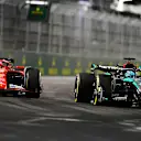 LAS VEGAS, NEVADA - NOVEMBER 23: George Russell of Great Britain driving the (63) Mercedes AMG Petronas F1 Team W15 leads Charles Leclerc of Monaco driving the (16) Ferrari SF-24 during the F1 Grand Prix of Las Vegas at Las Vegas Strip Circuit on November 23, 2024 in Las Vegas, Nevada. (Photo by Rudy Carezzevoli/Getty Images)