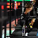 LAS VEGAS, NEVADA - NOVEMBER 23: Race winner George Russell of Great Britain and Mercedes reacts on the podium during the F1 Grand Prix of Las Vegas at Las Vegas Strip Circuit on November 23, 2024 in Las Vegas, Nevada. (Photo by Clive Rose - Formula 1/Formula 1 via Getty Images)