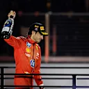 LAS VEGAS, NEVADA - NOVEMBER 23: Third placed Carlos Sainz of Spain and Ferrari celebrates on the podium during the F1 Grand Prix of Las Vegas at Las Vegas Strip Circuit on November 23, 2024 in Las Vegas, Nevada. (Photo by Chris Graythen/Getty Images)