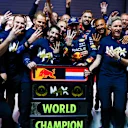 LAS VEGAS, NEVADA - NOVEMBER 23: 2024 F1 World Drivers Champion Max Verstappen of the Netherlands and Oracle Red Bull Racing celebrates with his team after the F1 Grand Prix of Las Vegas at Las Vegas Strip Circuit on November 23, 2024 in Las Vegas, Nevada. (Photo by Mark Thompson/Getty Images)