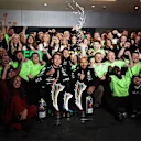 LAS VEGAS, NEVADA - NOVEMBER 23: Race winner George Russell of Great Britain and Mercedes and Second placed Lewis Hamilton of Great Britain and Mercedes celebrate with their team in the Pitlane after the F1 Grand Prix of Las Vegas at Las Vegas Strip Circuit on November 23, 2024 in Las Vegas, Nevada. (Photo by Meg Oliphant - Formula 1/Formula 1 via Getty Images)