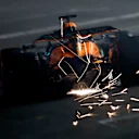 LAS VEGAS, NEVADA - NOVEMBER 22: Sparks fly behind Oscar Piastri of Australia driving the (81) McLaren MCL38 Mercedes during qualifying ahead of the F1 Grand Prix of Las Vegas at Las Vegas Strip Circuit on November 22, 2024 in Las Vegas, Nevada. (Photo by Chris Graythen/Getty Images)