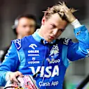 LAS VEGAS, NEVADA - NOVEMBER 22: 15th placed qualifier Liam Lawson of New Zealand and Visa Cash App RB walks in the Pitlane during qualifying ahead of the F1 Grand Prix of Las Vegas at Las Vegas Strip Circuit on November 22, 2024 in Las Vegas, Nevada. (Photo by Clive Rose - Formula 1/Formula 1 via Getty Images)
