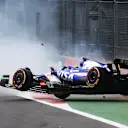 MEXICO CITY, MEXICO - OCTOBER 27: Yuki Tsunoda of Japan driving the (22) Visa Cash App RB VCARB 01 crashes at the start during the F1 Grand Prix of Mexico at Autodromo Hermanos Rodriguez on October 27, 2024 in Mexico City, Mexico. (Photo by Mark Thompson/Getty Images)