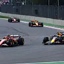 MEXICO CITY, MEXICO - OCTOBER 27: Carlos Sainz of Spain driving (55) the Ferrari SF-24 leads Max Verstappen of the Netherlands driving the (1) Oracle Red Bull Racing RB20 on track during the F1 Grand Prix of Mexico at Autodromo Hermanos Rodriguez on October 27, 2024 in Mexico City, Mexico. (Photo by Mark Thompson/Getty Images)