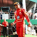 MEXICO CITY, MEXICO - OCTOBER 27: Third placed Charles Leclerc of Monaco and Ferrari on the podium after the F1 Grand Prix of Mexico at Autodromo Hermanos Rodriguez on October 27, 2024 in Mexico City, Mexico. (Photo by Bryn Lennon - Formula 1/Formula 1 via Getty Images)