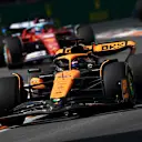 MIAMI, FLORIDA - MAY 05: Oscar Piastri of Australia driving the (81) McLaren MCL38 Mercedes leads Charles Leclerc of Monaco driving the (16) Ferrari SF-24 on track during the F1 Grand Prix of Miami at Miami International Autodrome on May 05, 2024 in Miami, Florida. (Photo by Jared C. Tilton - Formula 1/Formula 1 via Getty Images)