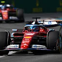 MIAMI, FLORIDA - MAY 05: Charles Leclerc of Monaco driving the (16) Ferrari SF-24 leads Carlos Sainz of Spain driving (55) the Ferrari SF-24 on track  during the F1 Grand Prix of Miami at Miami International Autodrome on May 05, 2024 in Miami, Florida. (Photo by Jared C. Tilton - Formula 1/Formula 1 via Getty Images)